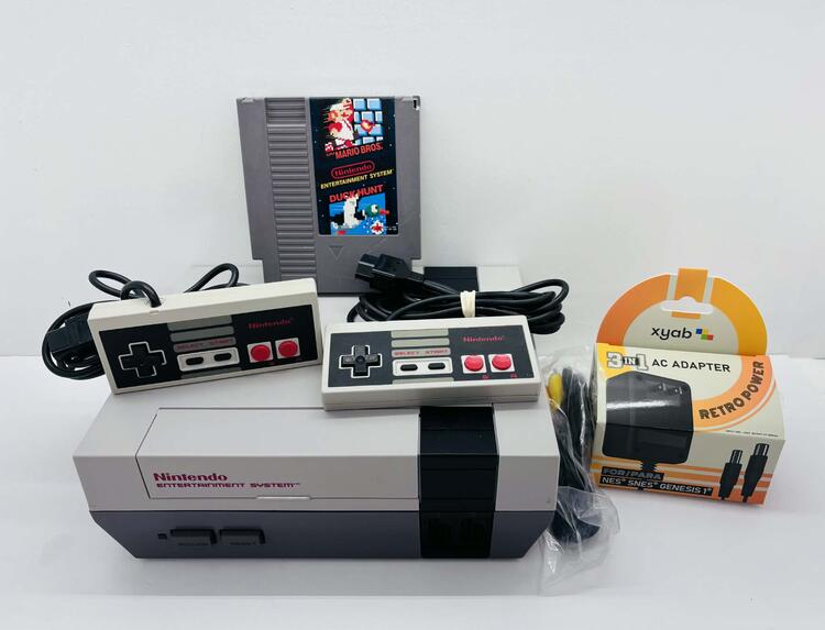 NINTENDO ENTERTAINMENT SYSTEM + 2 CONTROLLERS + SUPER MARIO BROS. (usagé)