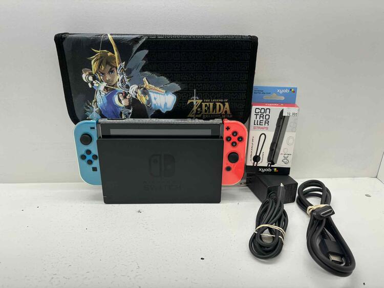 NINTENDO SWITCH MODEL 2 RED AND BLUE + CARRY CASE + 64 GB SD CARD (used)