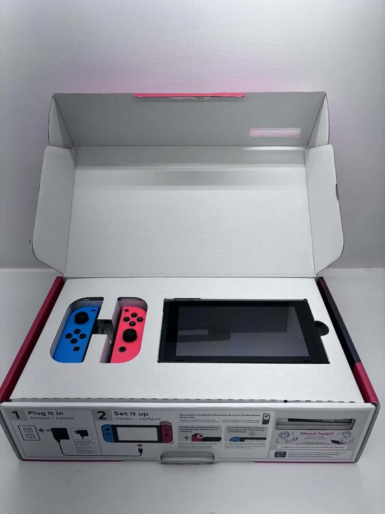 NINTENDO SWITCH MODEL 2 RED AND BLUE (COMPLETE IN BOX) (usagé)