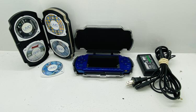 PSP 2001 BLUE + CASE + 1GB MEMORY STICK + 5 GAMES