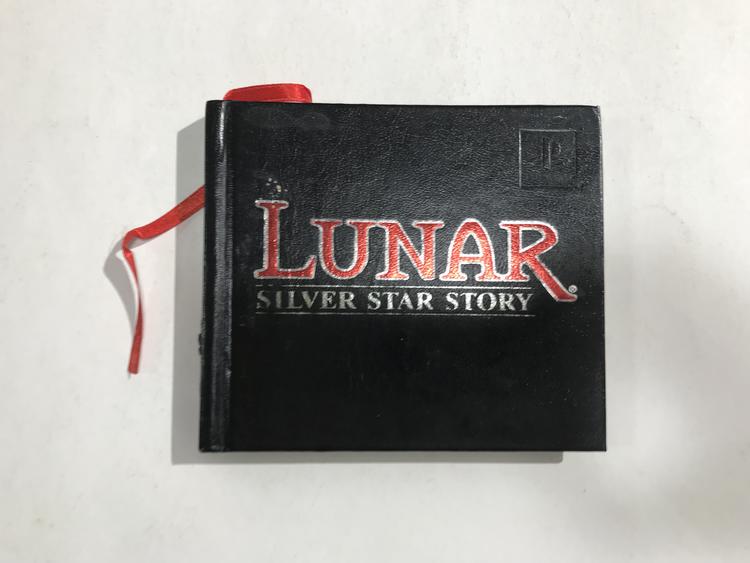 PS1 LUNAR SILVER STAR STORY HARD BOOK INSTRUCTION BOOKLET + STRATEGY GUIDE ENGLISH