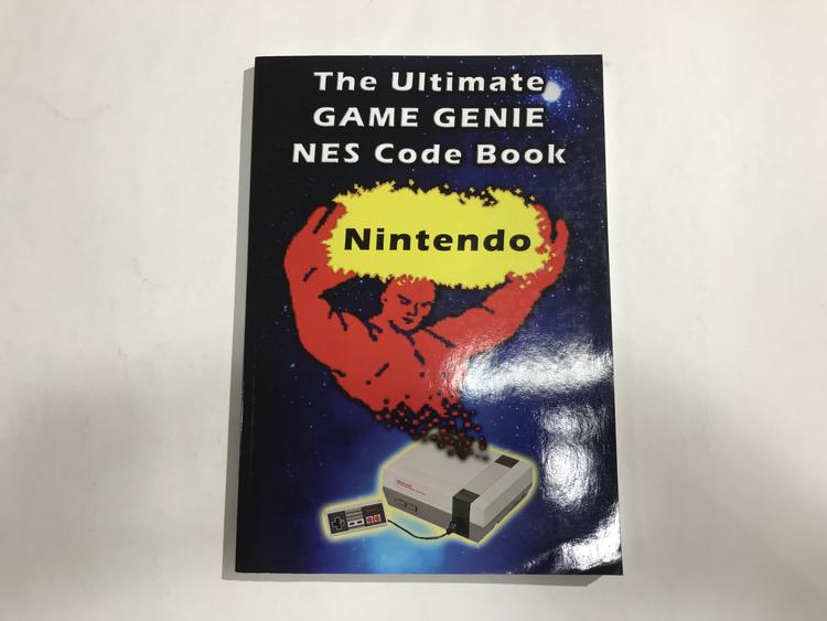 HINT BOOK GAME GENIE NES CODE BOOK (usagé)
